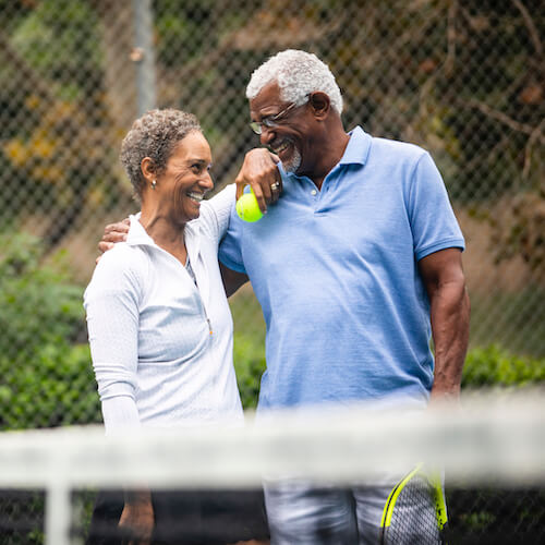 couple playing tennis